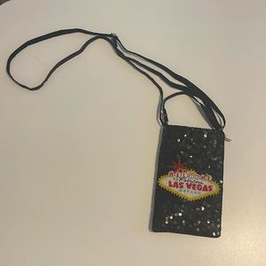 Sequined phone/ crossbody or wristlet. Never worn/used.